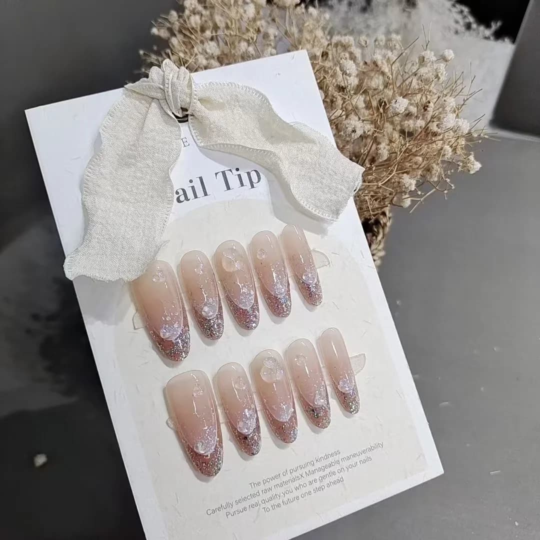 Umjetne nokte s glitter halo efektom, dugi ovalni oblik, višekratne