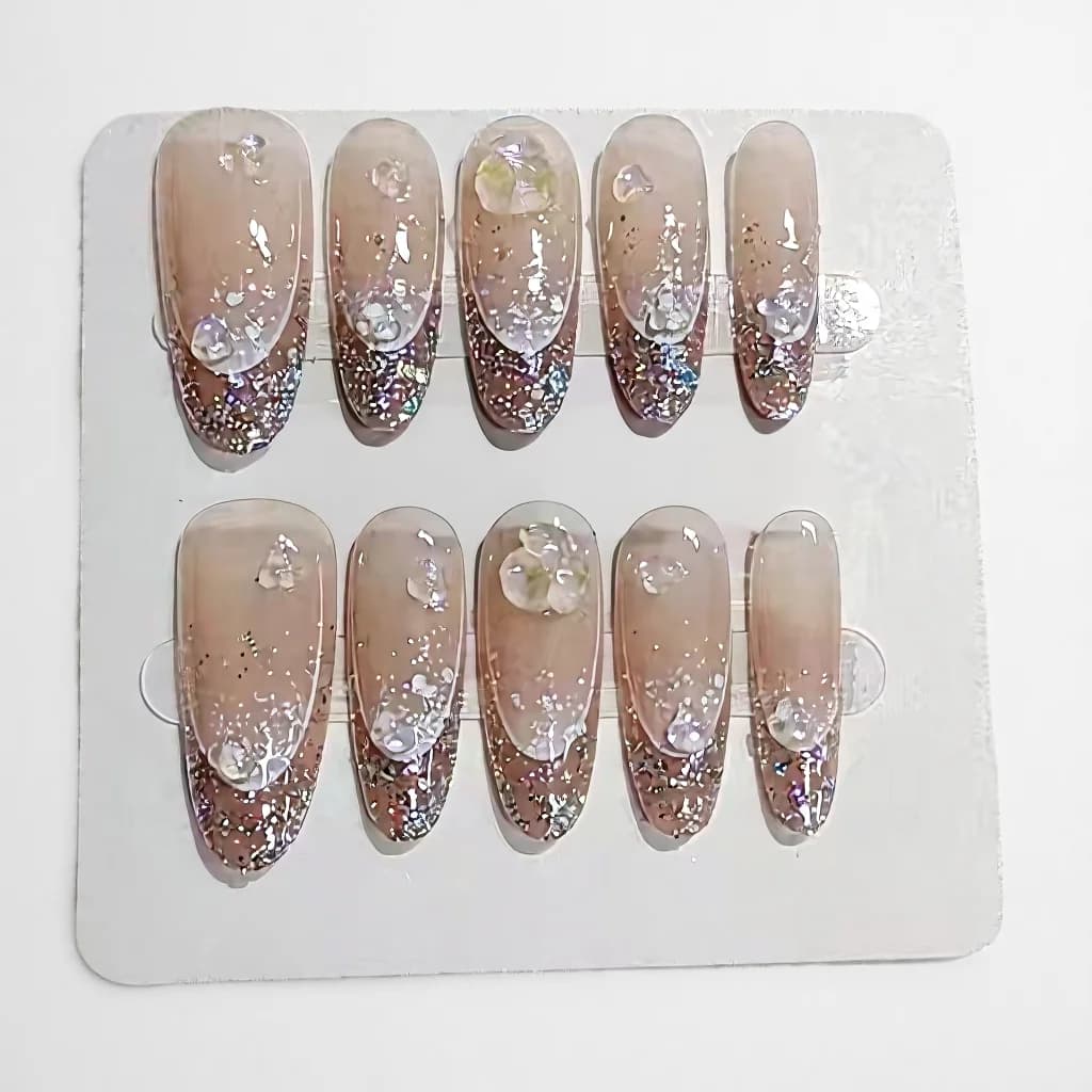 Umjetne nokte s glitter halo efektom, dugi ovalni oblik, višekratne